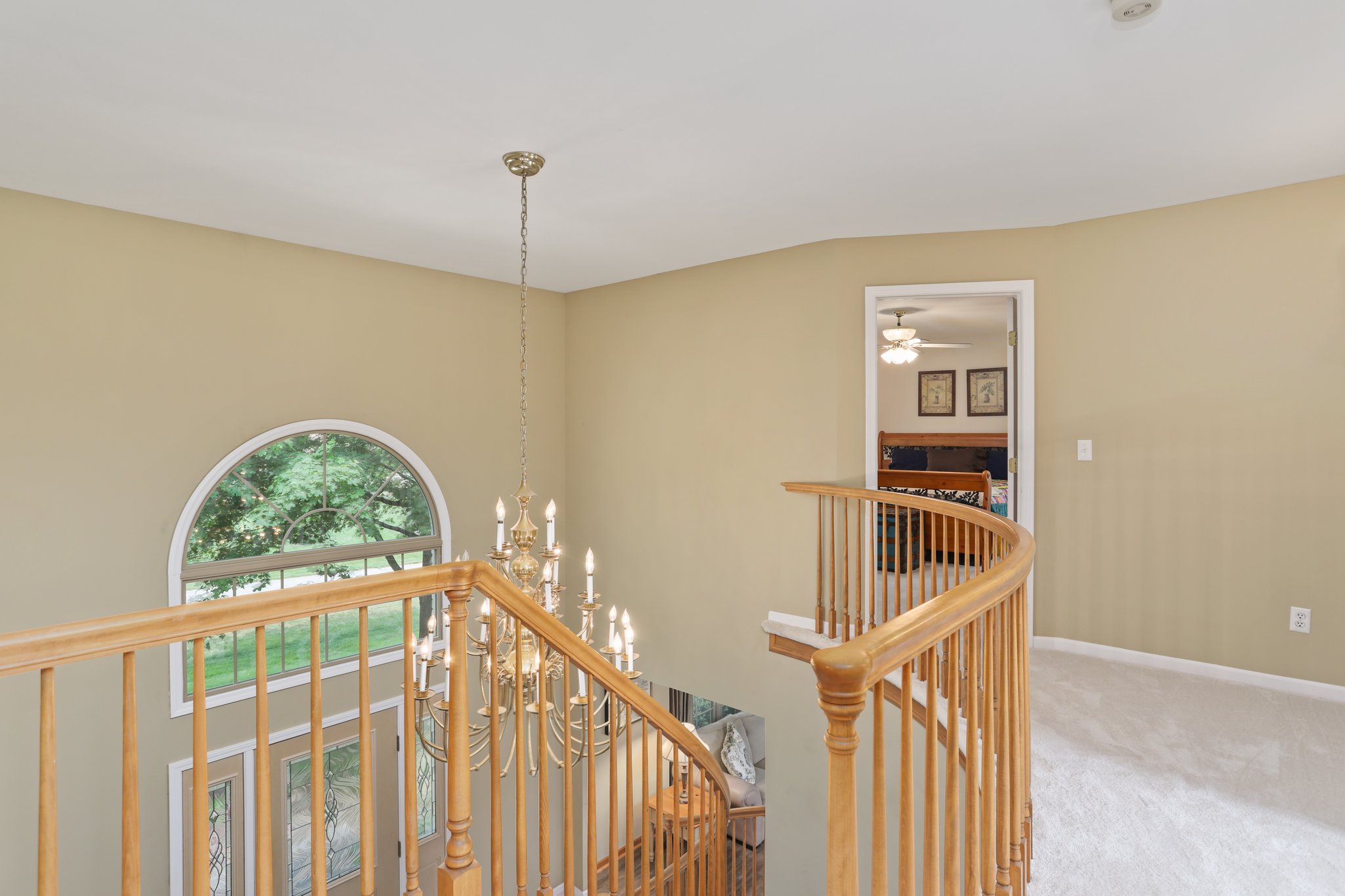 2 story foyer with curved staircase