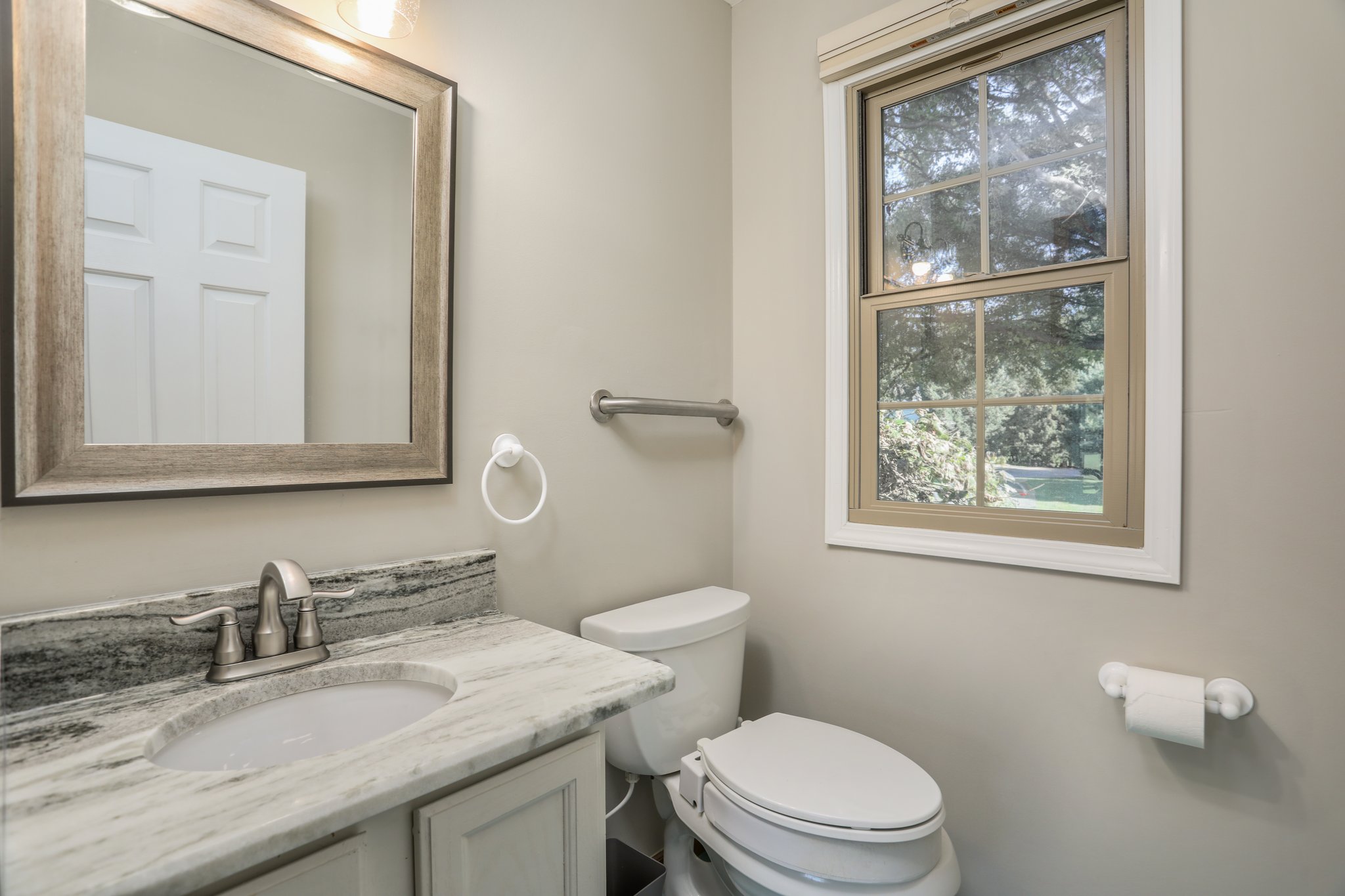 Half bath with new granite and fixtures