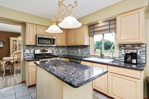 Kitchen with island and granite