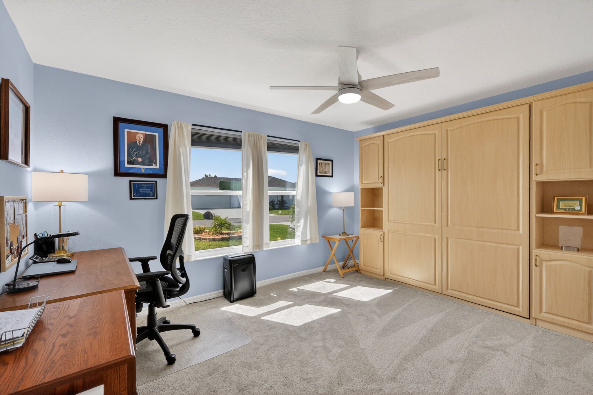 Second Bedroom with Custom Cabinetry and Murphy Bed