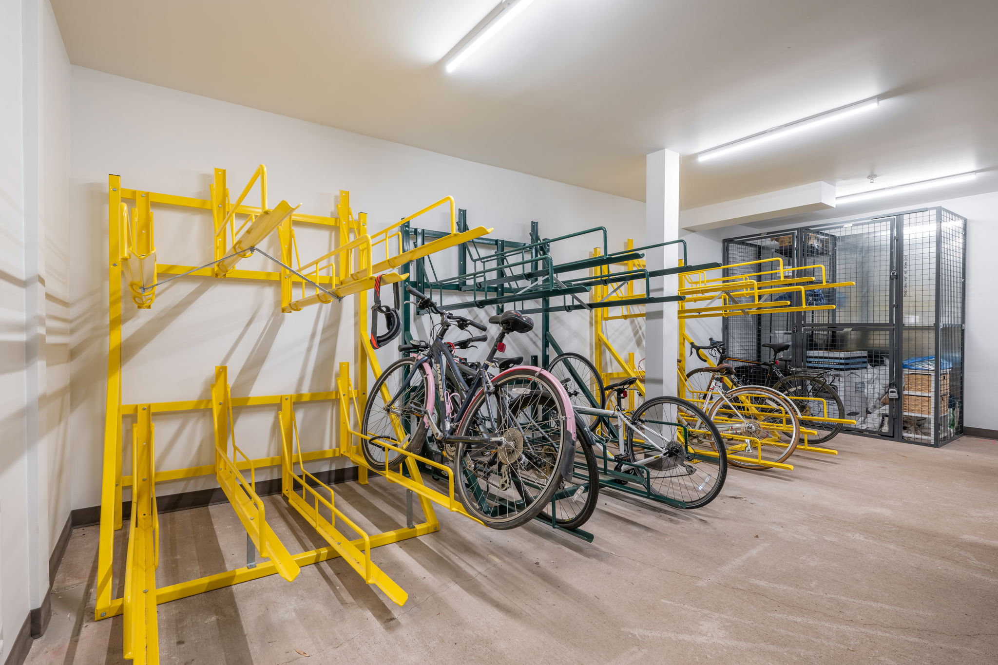 Secured bike storage room and the home comes with a separate storage locker