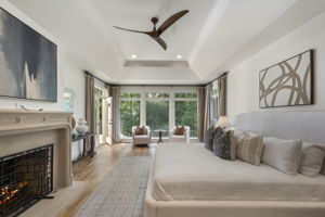 Primary Bedroom on main with doors to patio