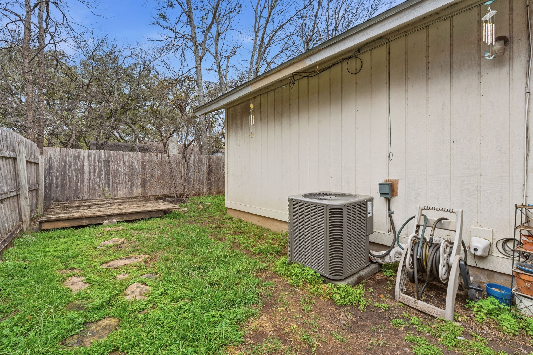 Unit A. Side yard.