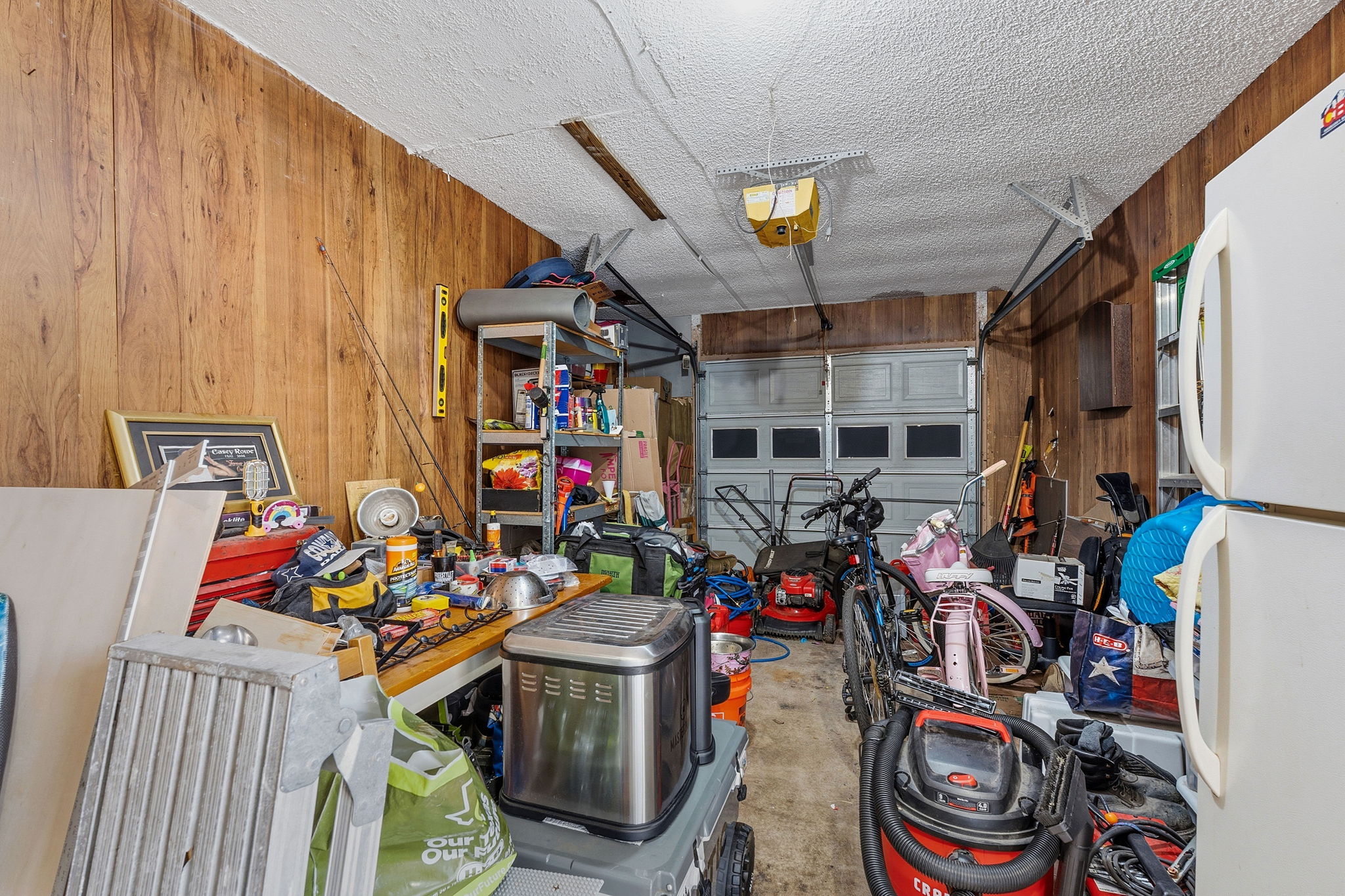 Unit A. Garage (this extra refrigerator belongs to tenant).