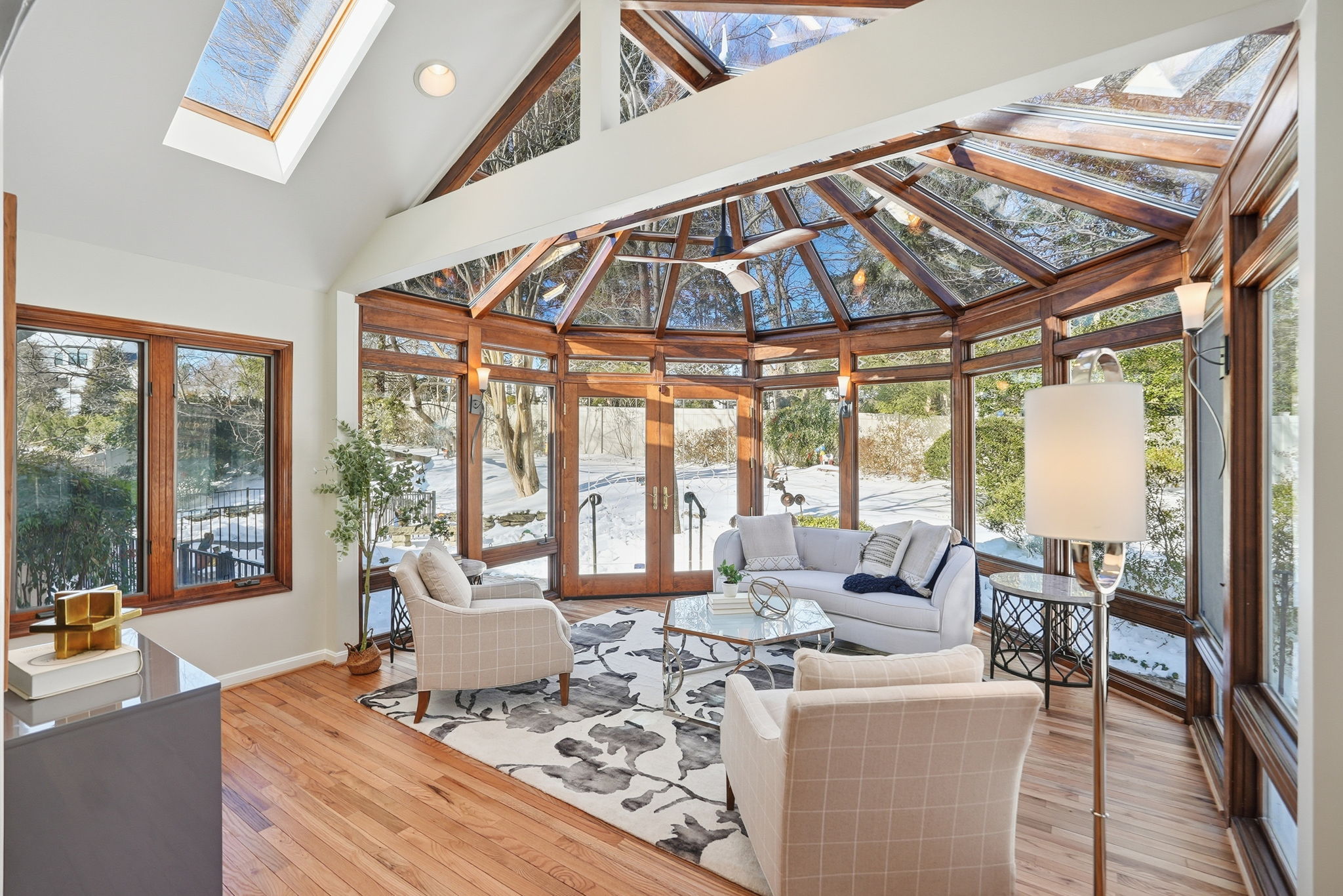 Sun Porch open to lush backyard retreat