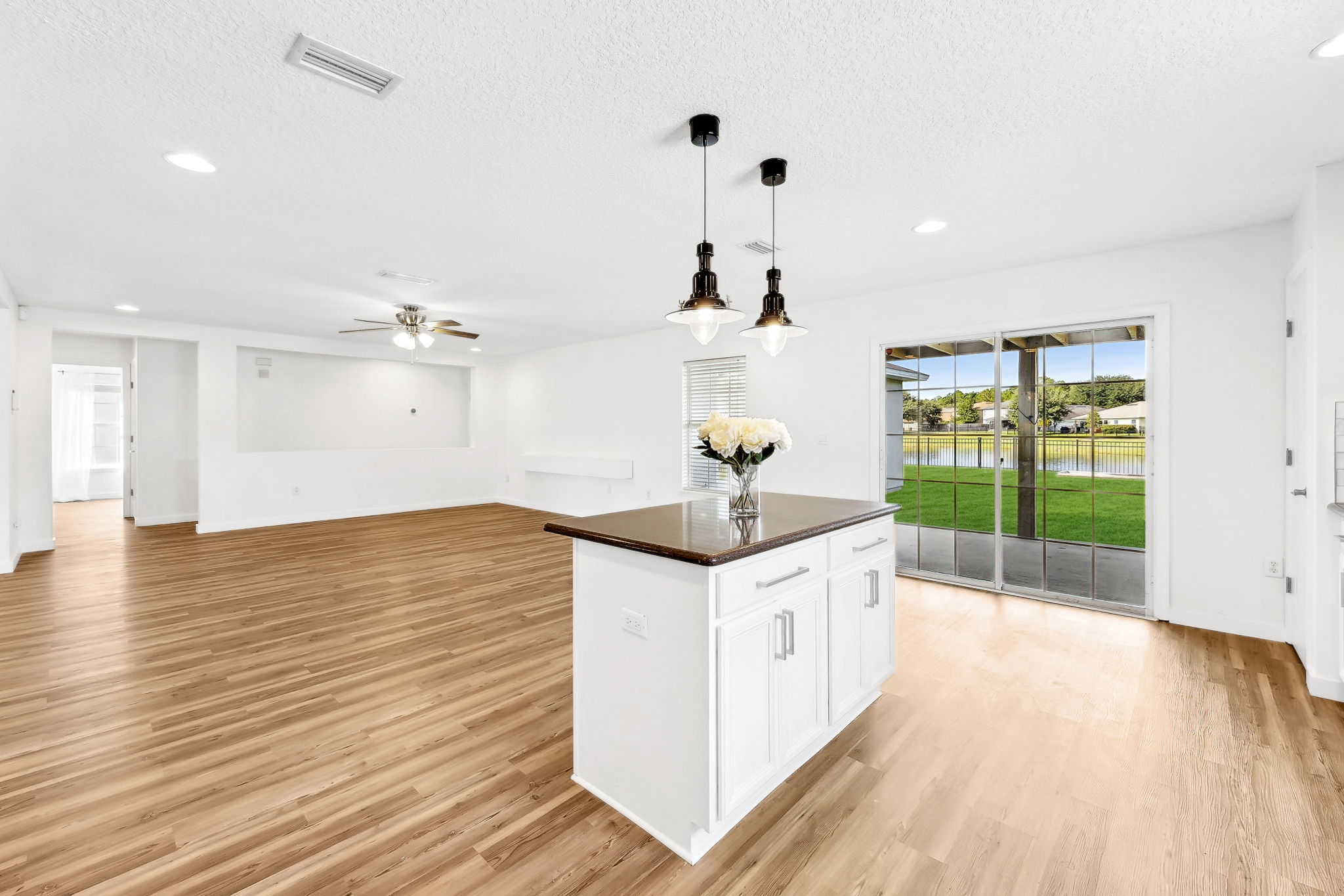 The living areas and the kitchen offer wonderful views of the water ...