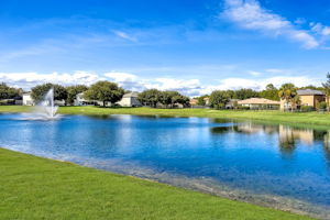 The lake’s fountain fills the backyard with the soothing sound of water