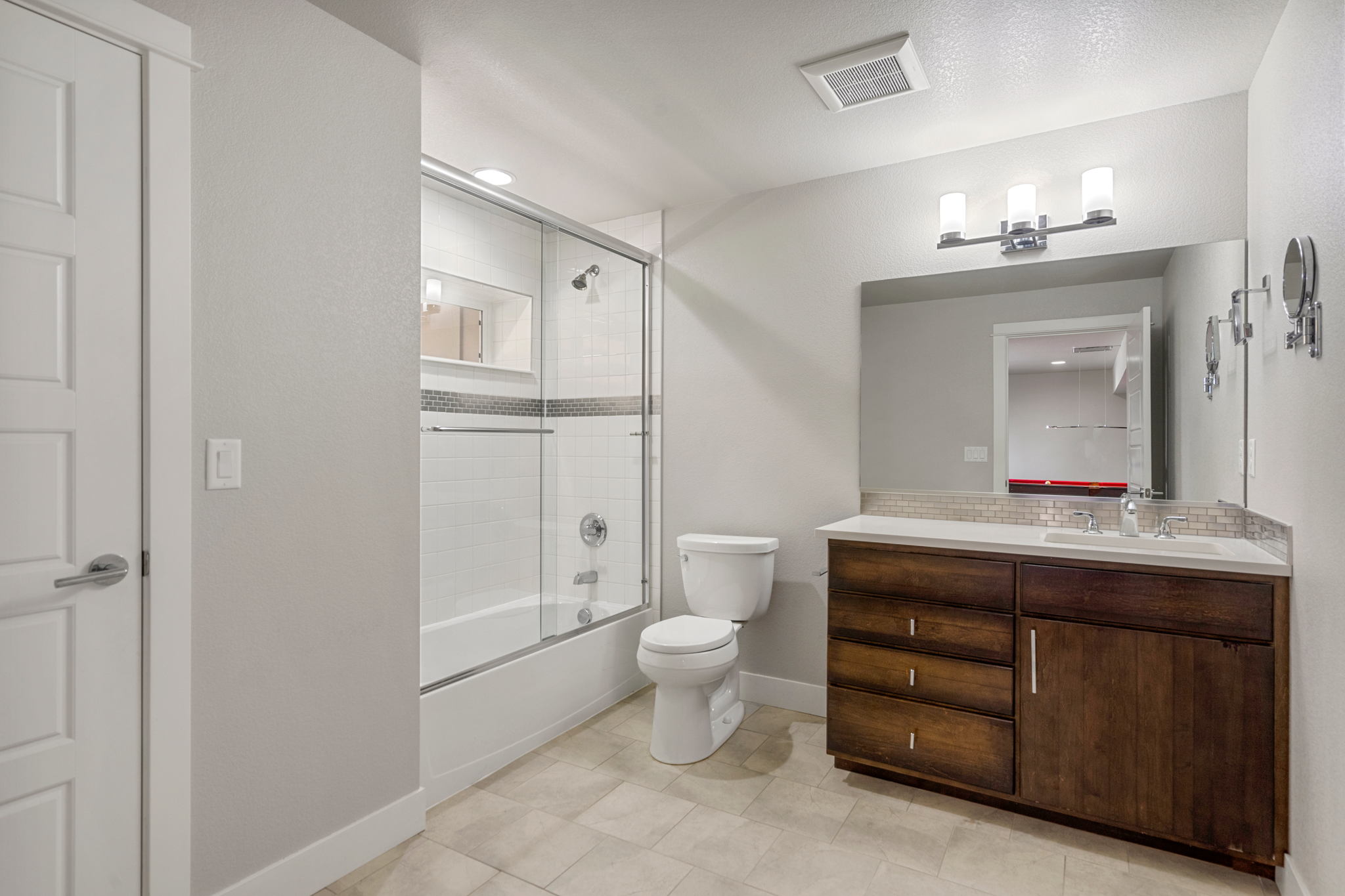 Full Bathroom on Walk-Out Level with Linen Closet