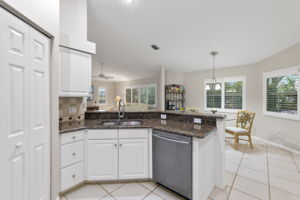 Kitchen / White Cabinetry and Granite Countertops