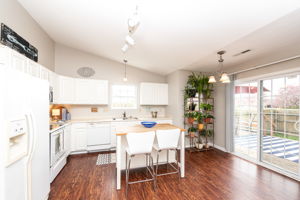 Spacious, bright & cheerful kitchen with adjacent breakfast nook is the perfect place to enjoy sunsets.