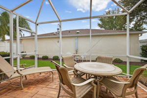 Screened Porch with Remote-Controlled Retractable Awning