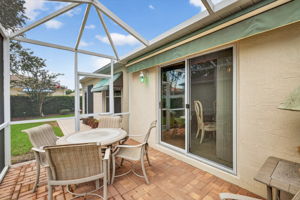 Screened Porch with Remote-Controlled Retractable Awning