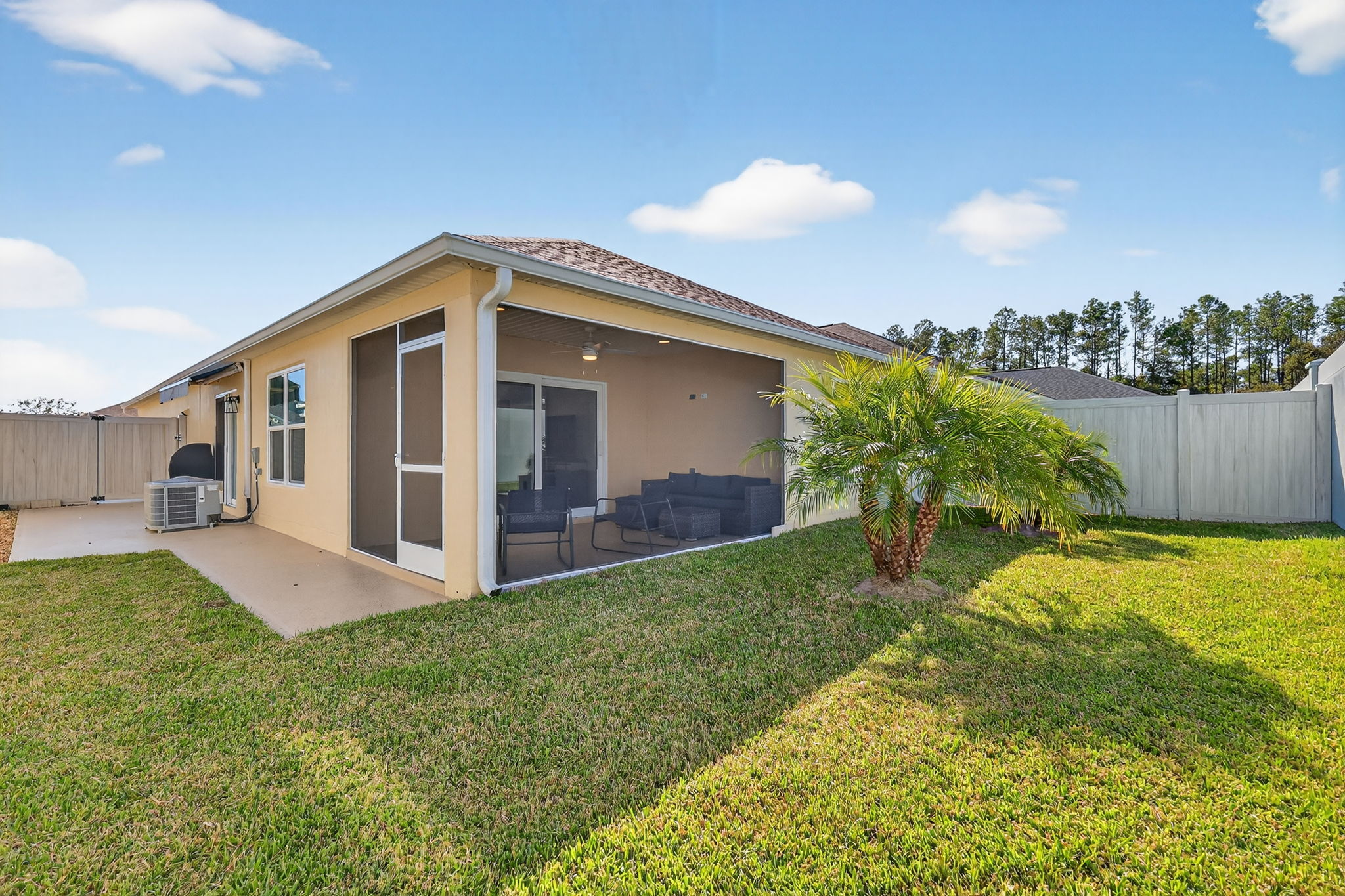Rear Elevation with Fenced Yard and Side Courtyard