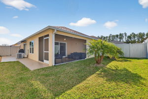 Rear Elevation with Fenced Yard and Side Courtyard
