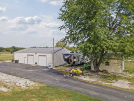 Outbuilding w/ electricity, water, non-conforming bedroom and full bath