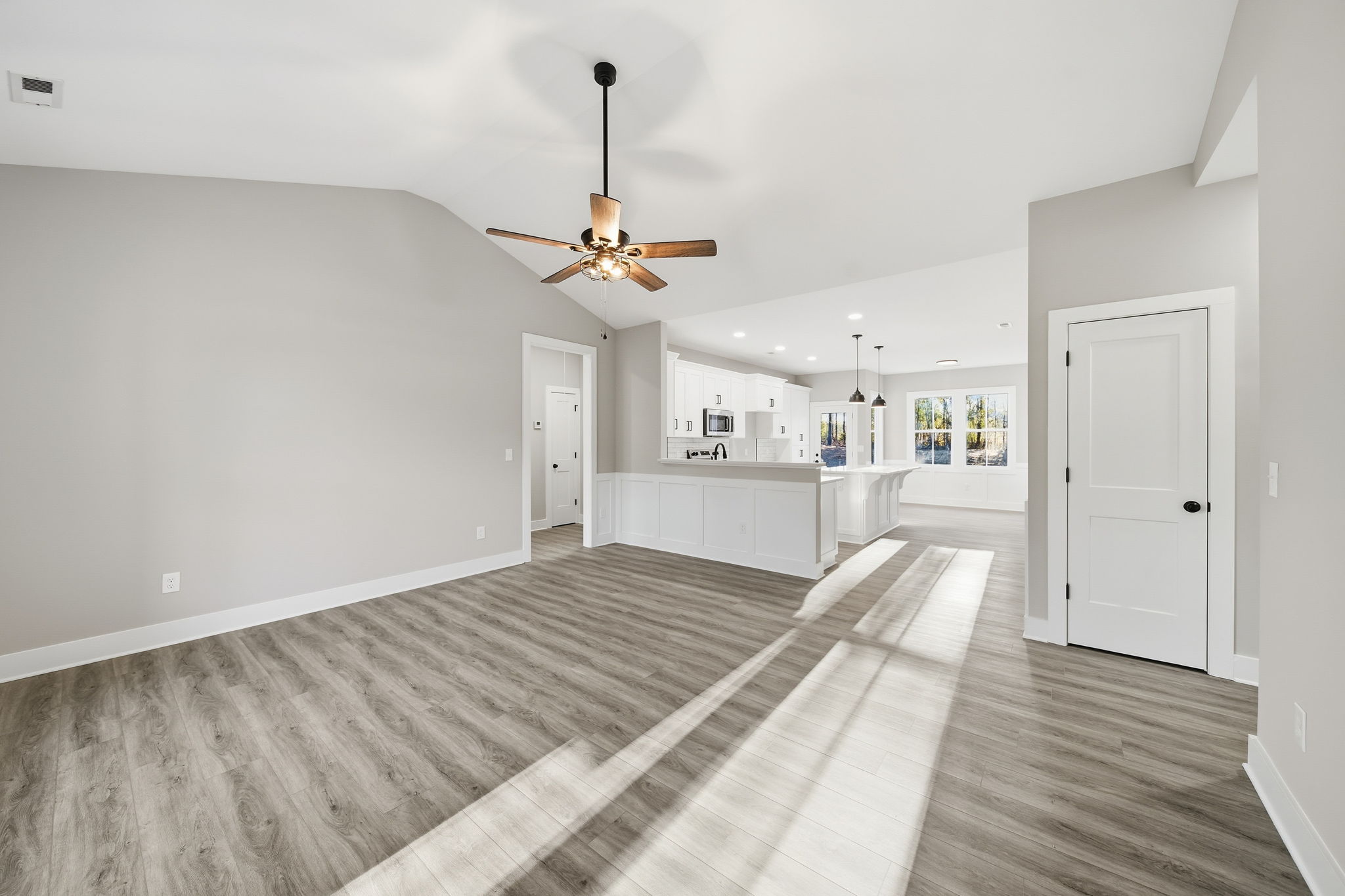 Living Room with Coat Closet/Kitchen