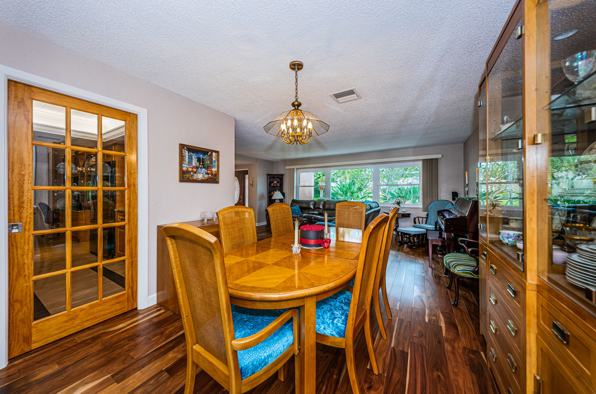 Kitchen has charming wood-panel pocket doors.