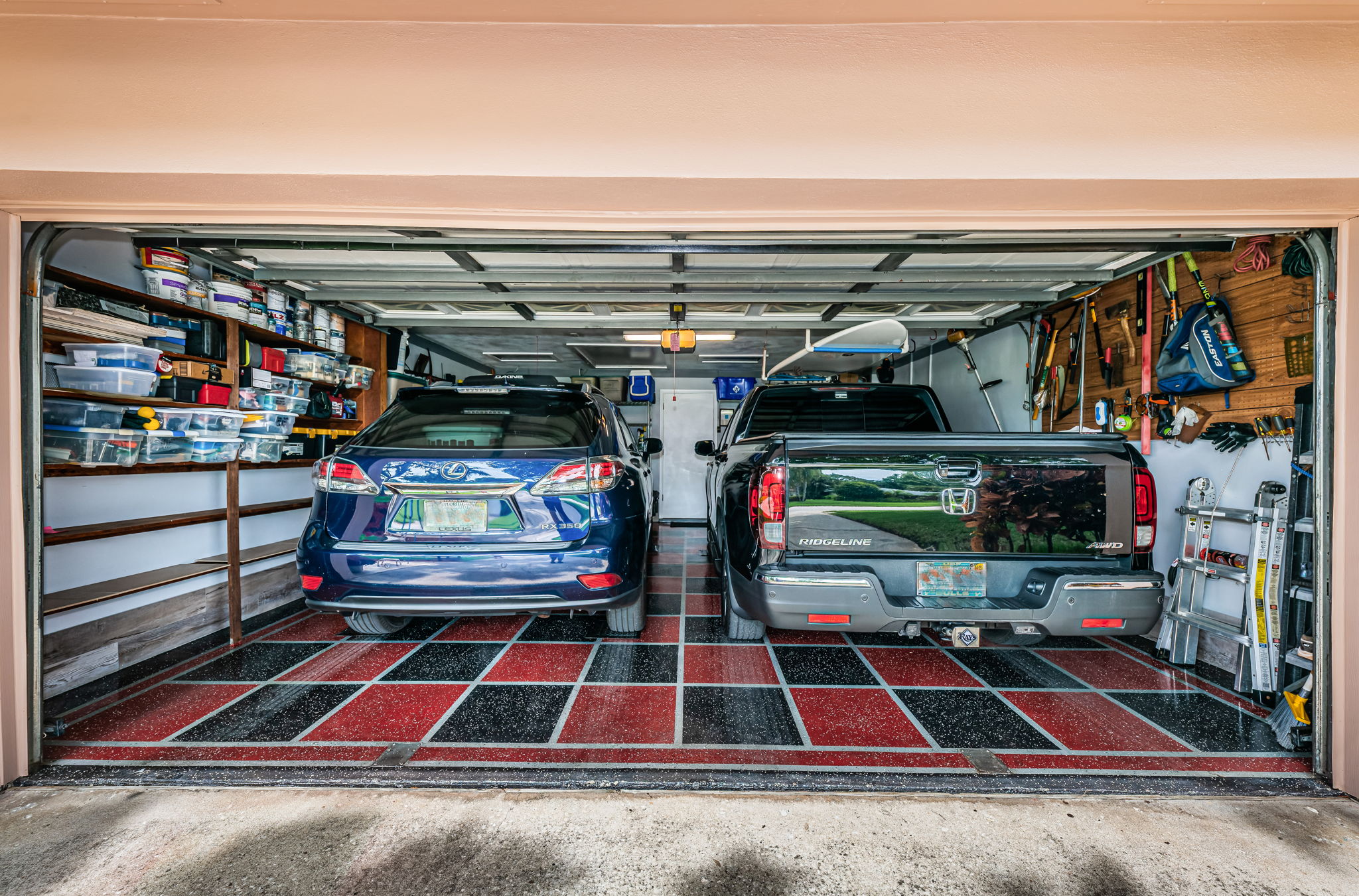 Storage and fits two vehicles. (Notice one is a pick up truck!)