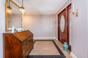 Enter - walk straight back into the spacious family room.  Walk to the left to enter the living room and dining area.