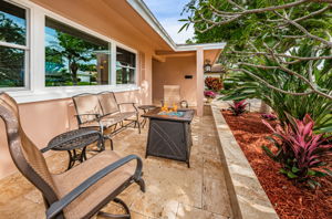 Travertine paved front patio