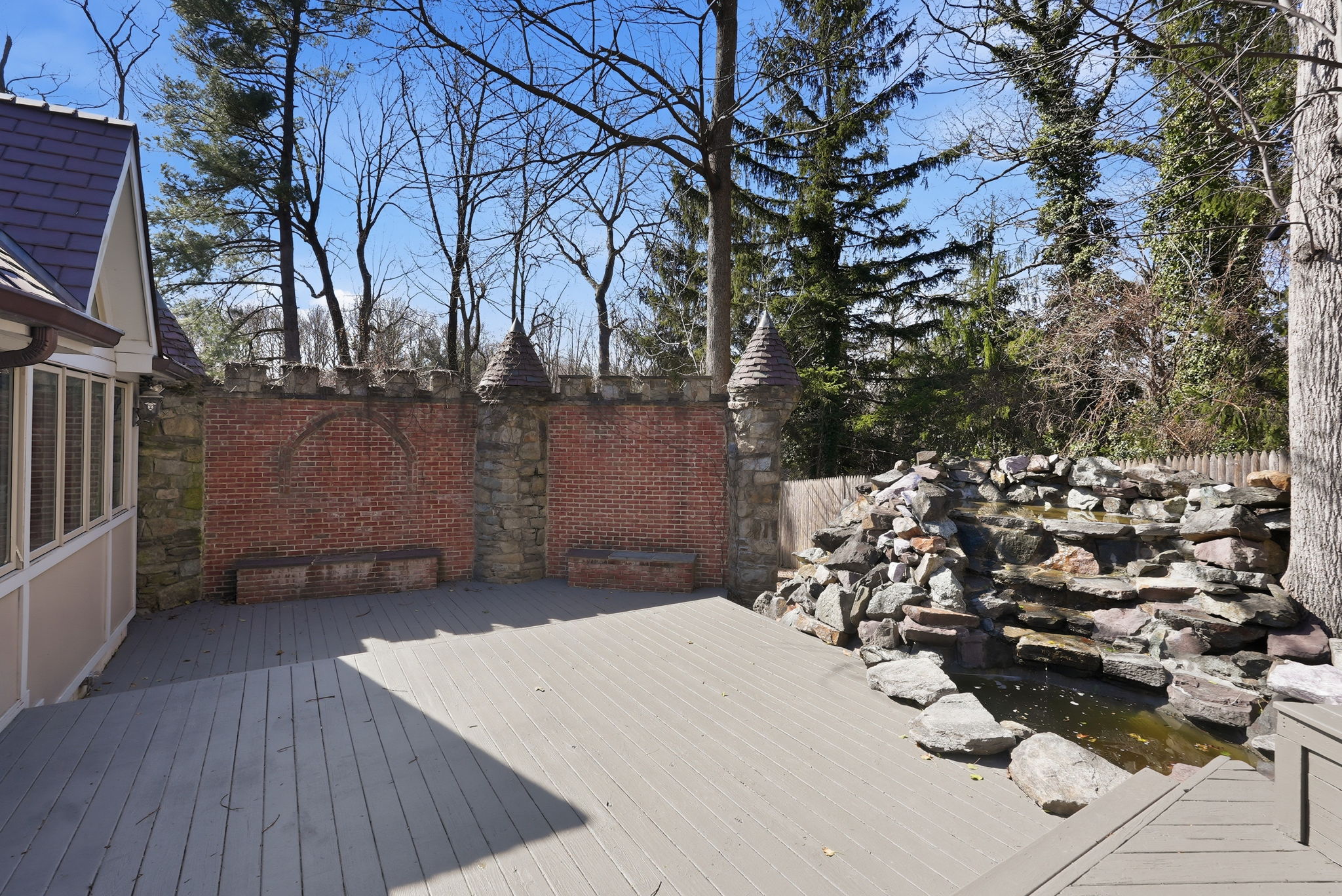 Rear Deck with Stone Waterfall & Pond
