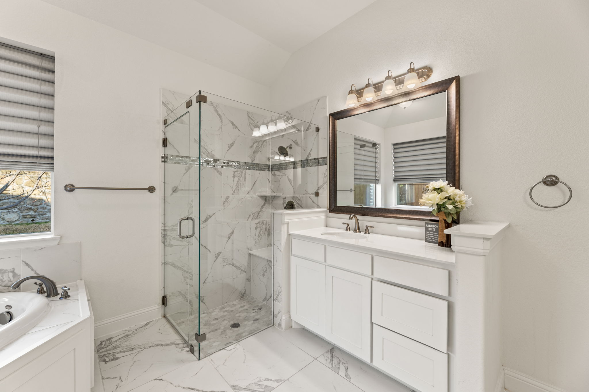 Master Bath - frameless glass shower with bench seating