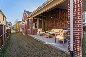 Covered Patio and side  yard (virtually staged)