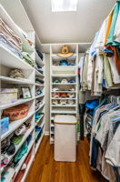 Primary Bedroom Walk-in Closet1b