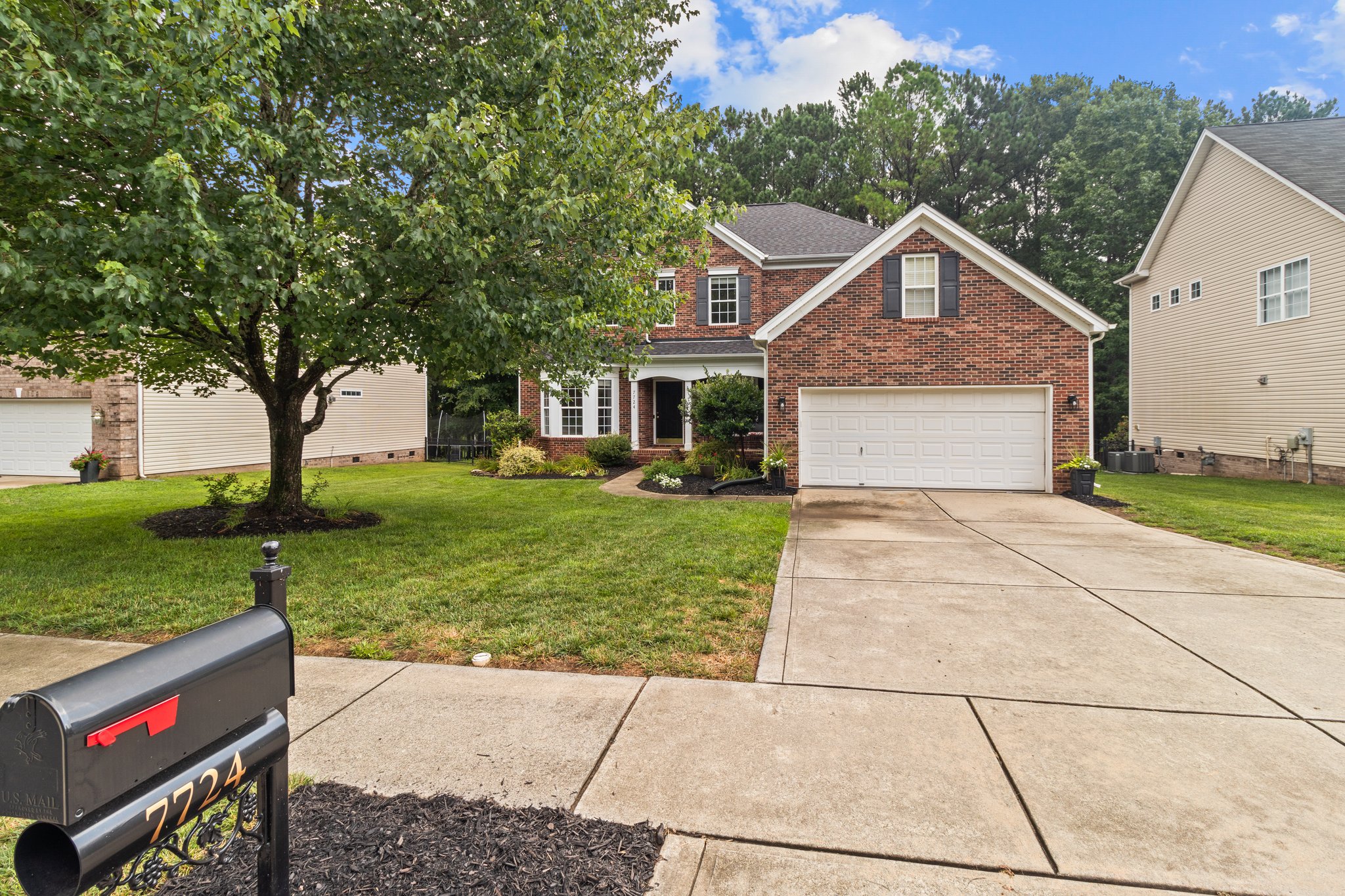 Mature landscaping offers shade during the hot months!