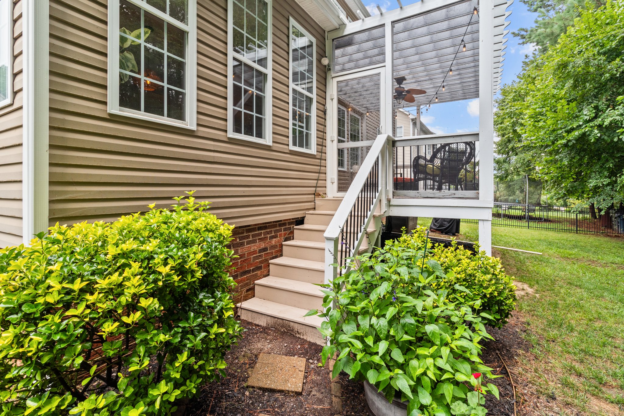 Back stairs access to screened porch