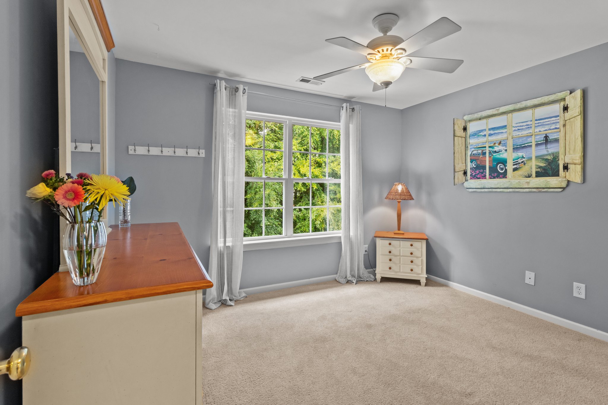 Bedroom 2 also overlooks the wooded backyard