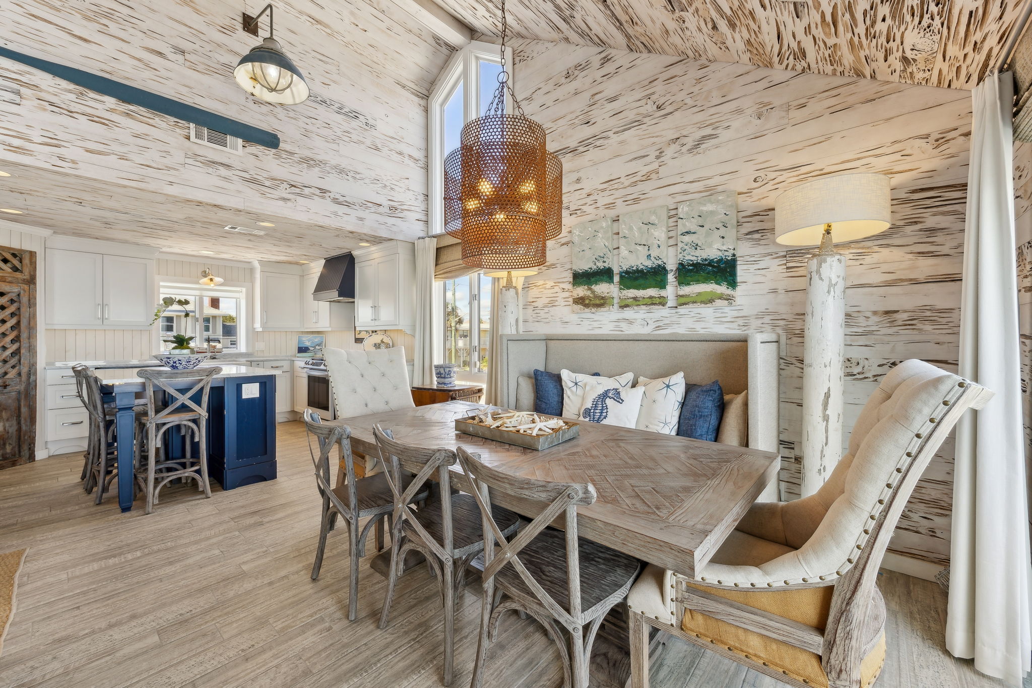 ...layered with designer lighting, vintage-inspired accents, and furnishings that feel collected rather than staged.