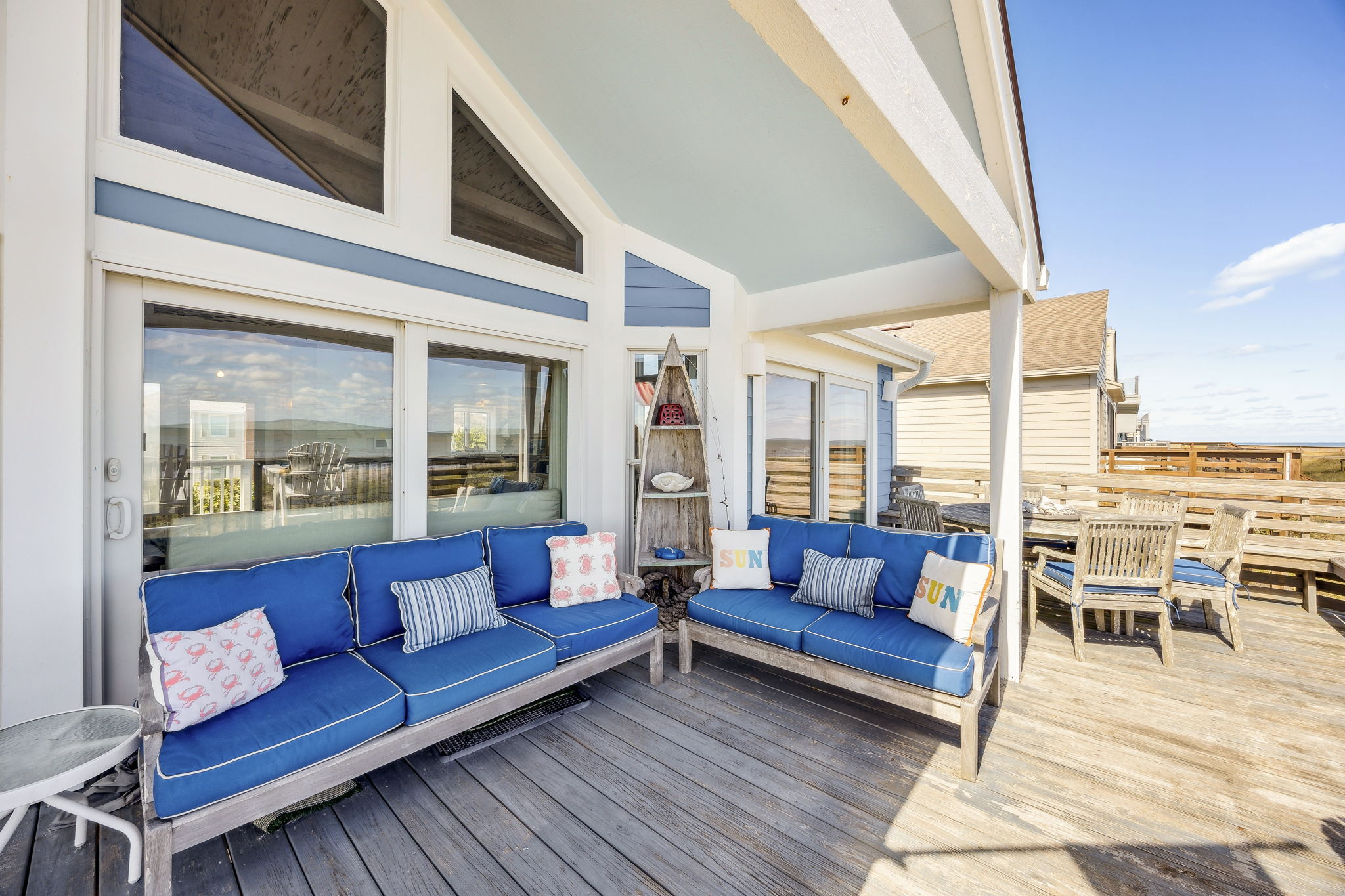 Multiple seating areas make the deck feel effortless for morning coffee, afternoon lounging, and evening conversation...