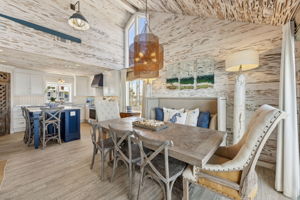 ...layered with designer lighting, vintage-inspired accents, and furnishings that feel collected rather than staged.