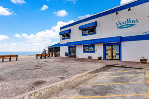 The Sandbar adds another beachfront favorite, known for one of Florida’s most extensive whiskey collections.