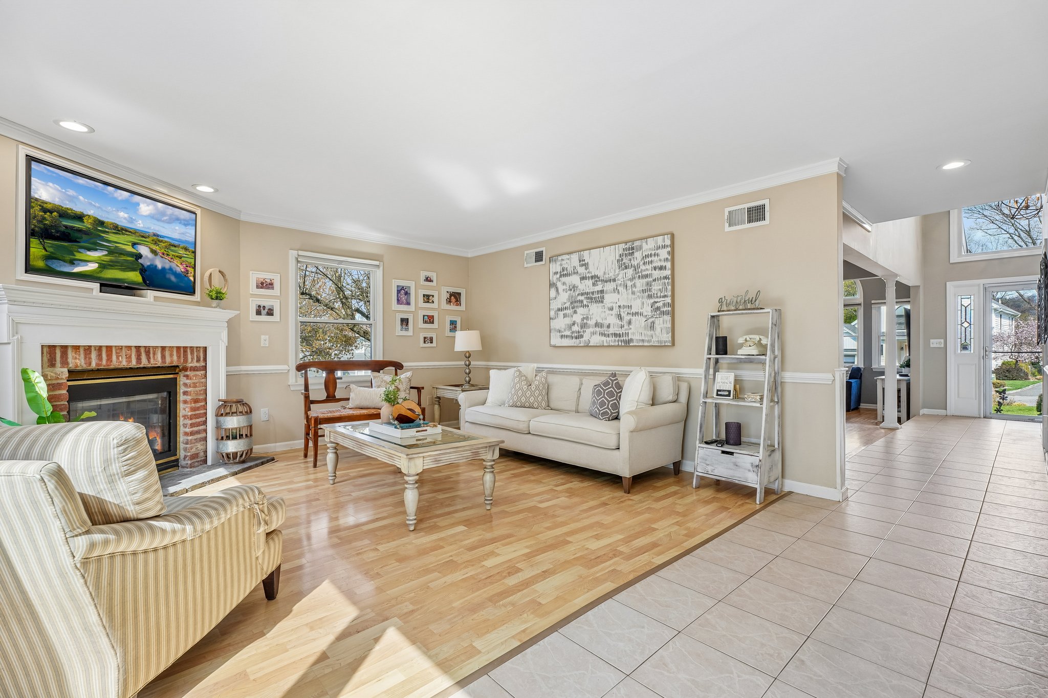 Tucked just beyond the main living space,  the family room is the perfect retreat for movie nights, game days, or a quiet afternoon.