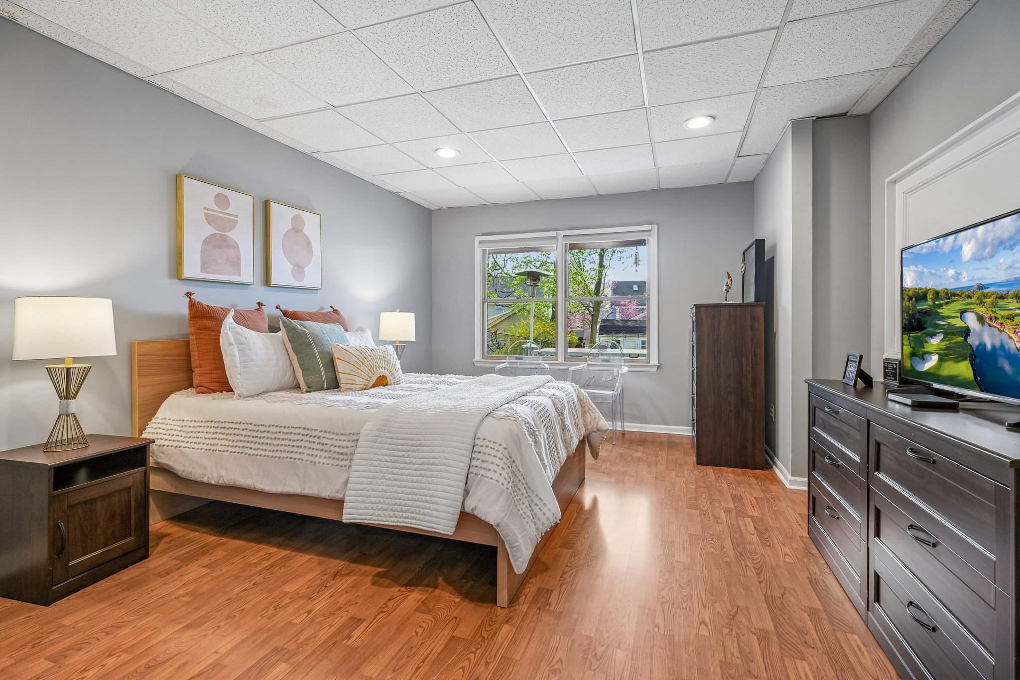 Here’s where the home really adapts to you - a private lower-level retreat with its own entrance, offering three generous rooms and a full bath. Perfect for extended living, guests, or a beautifully separate work-from-home setup.