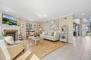 Tucked just beyond the main living space,  the family room is the perfect retreat for movie nights, game days, or a quiet afternoon.