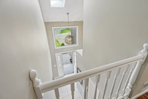 The light-filled 2nd floor landing sets the tone - open, airy, and connected.