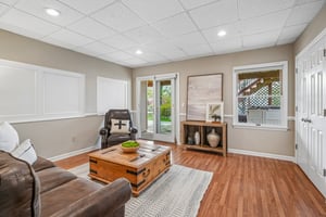 A beautifully flexible space with multiple living zones, perfect for whatever the day calls for, and an easy walk-out to the backyard.