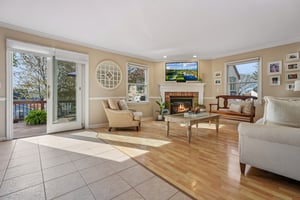 Sunlight pours in, the fireplace glows, and just beyond - the deck calls you outside. This is how everyday living should feel.
