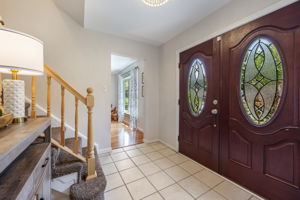 Double entry doors open to inviting Foyer