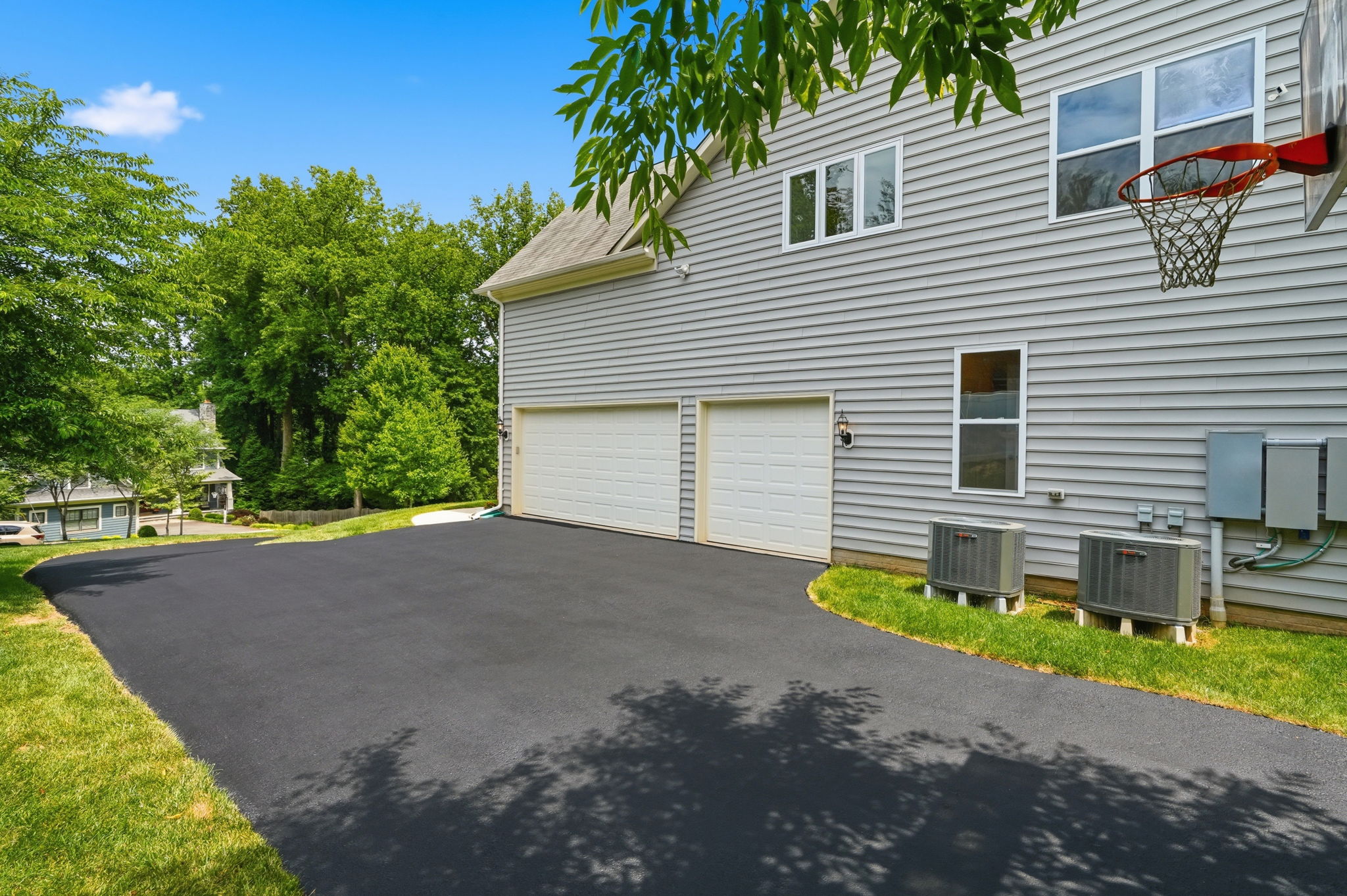 Freshly Sealed Driveway w/ 3-Car Garage