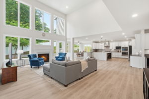 Two Story Family Room Open to Kitchen and Breakfast Room