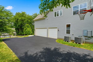 Freshly Sealed Driveway w/ 3-Car Garage