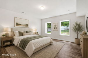 Lower Level Bedroom with Ensuite bathroom and Walk-in Closet