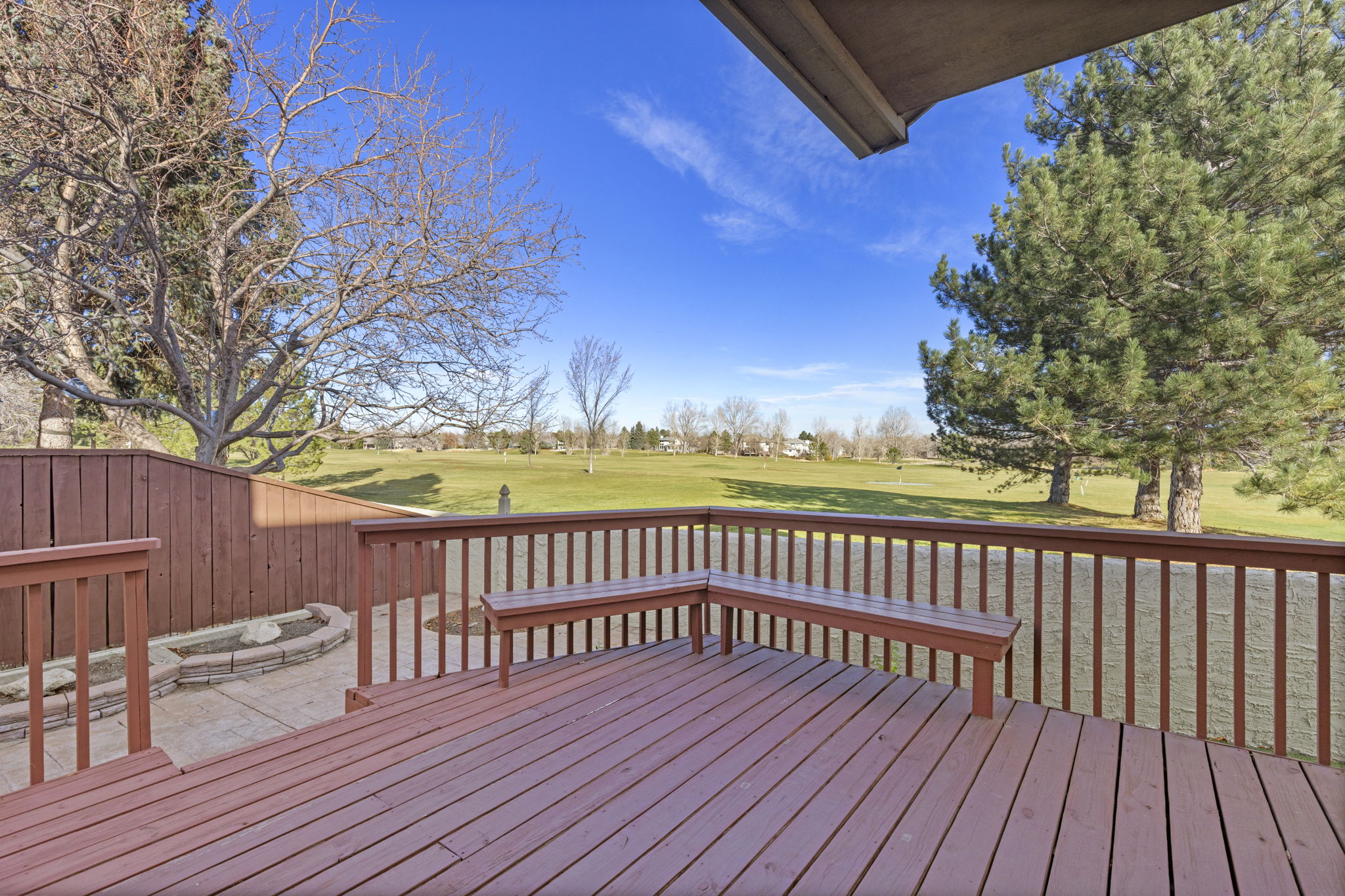 Large deck and patio with picturesque golf course views