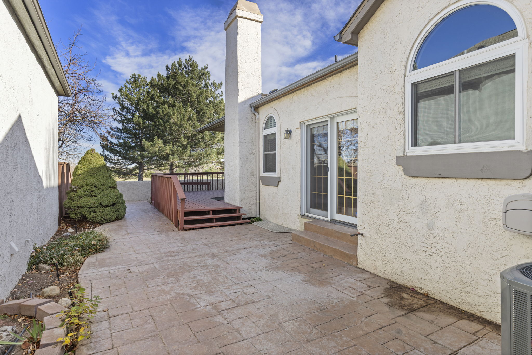 Large deck and patio with picturesque golf course views