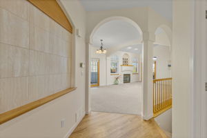 Well-planned layout, vaulted ceilings, arches, built-ins and rounded corners