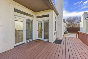 Large deck and patio with picturesque golf course views